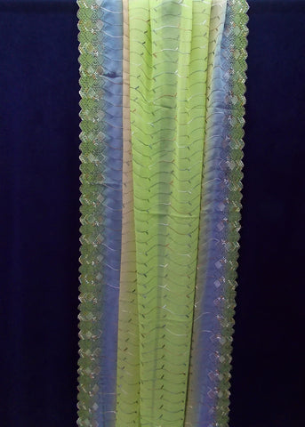 Semi-sheer 2.5 yd embroidered overlay fabric embroidered border green, beige, and slate blue